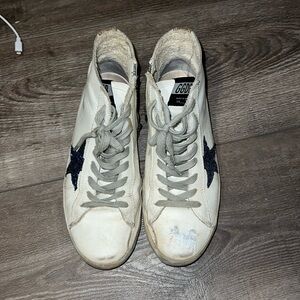 Used golden goose size 67. In used shape but still have tons of wear left
